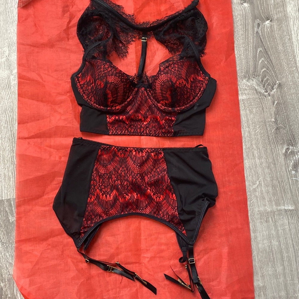 Lingerie worn once. Size small. Garter belt and matching tie neck top